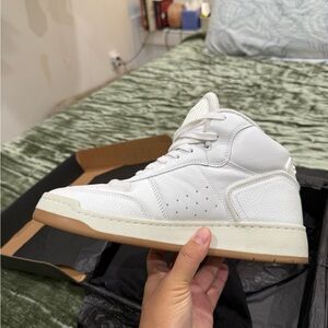 Yves Saint Laurent White Leather High-Top Sneakers with heart sole.